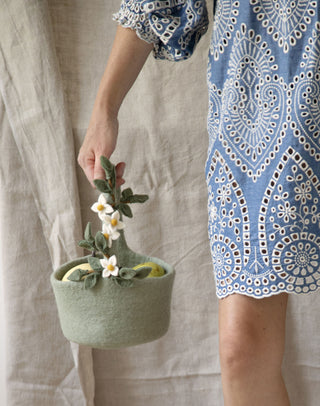 Easter egg hunting flower basket