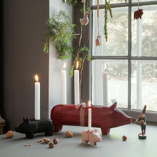 Large red wooden pig candle holder