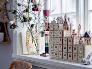 Wooden advent calendar with village