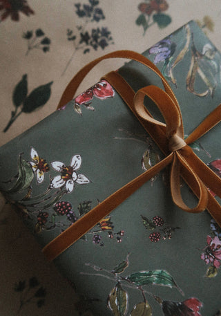 Flowers on dark grey gift wrapping paper