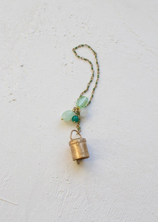 Brass bell ornament with beads