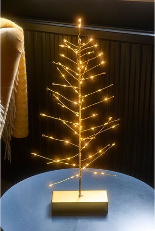 Gold lighted festive tree