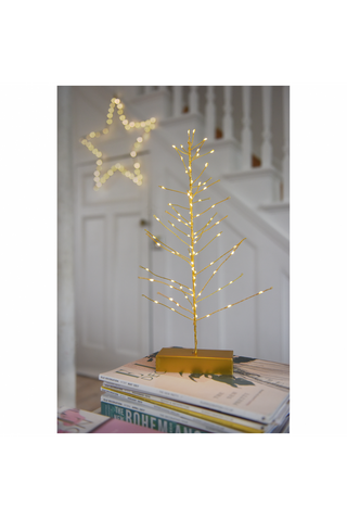 Gold lighted festive tree