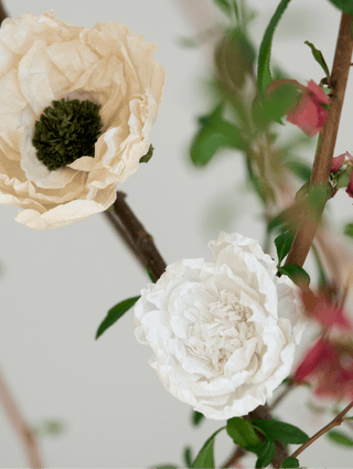 Handmade antique-inspired crepe paper flowers