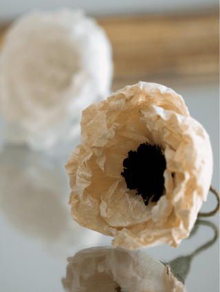 Handmade antique-inspired crepe paper flowers