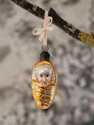 Vintage swaddled baby glass ornament with pacifier