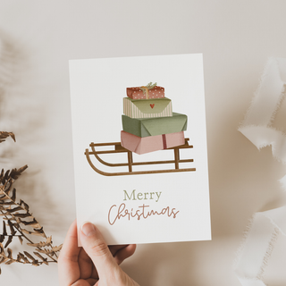 Christmas card - sleigh with gifts