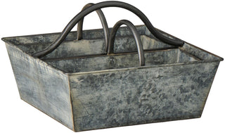 Empty grey weathered metal basket with two curved handles, angled view on a white background