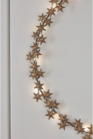 NORDIC.CHRISTMAS - Brass stars lighted wreath