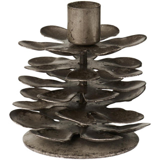 Pewter-toned brass candle holder shaped like a layered pine cone with a cylindrical candle socket on top, on a white background