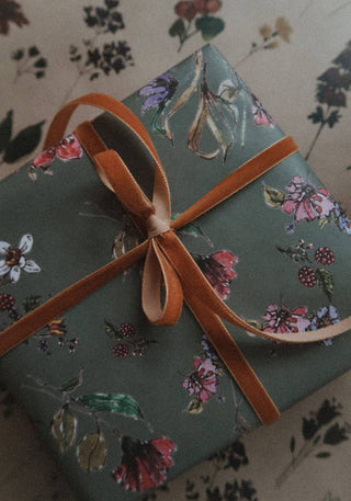 Flowers on dark grey gift wrapping paper