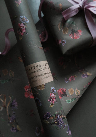 Flowers on dark grey gift wrapping paper