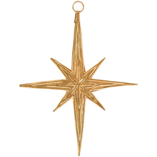 Gold metal oblong star ornament with a long lower point and a hanging loop, on a white background
