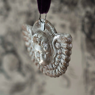 Vintage metal silvered angel's head and wings